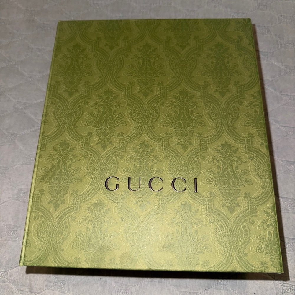 Brand new Gucci box with magnetic closure, comes with dust bag